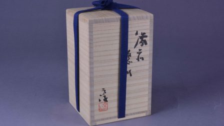 Special wooden box of the bottle. The signature of the producer is on the surface of the boxes.